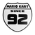 Mario Kart Since 1992 Wall Sign – Retro Gaming Shield Design – 8.53" x 8.54" – Adhesive Pad Included