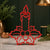 Candle with Holly [RED] — lifestyle